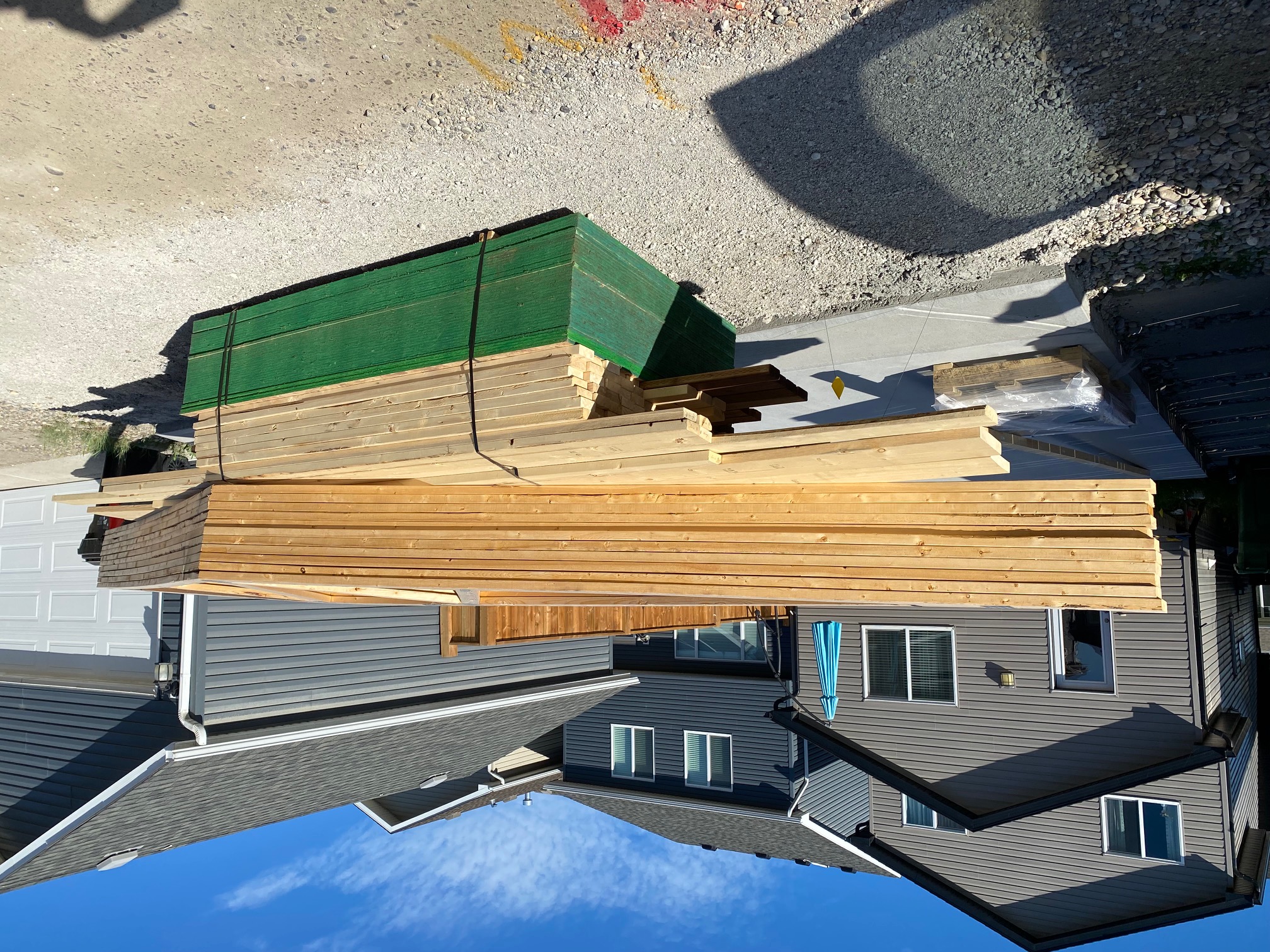 Lumber delivered in preparation for framing in Cranston